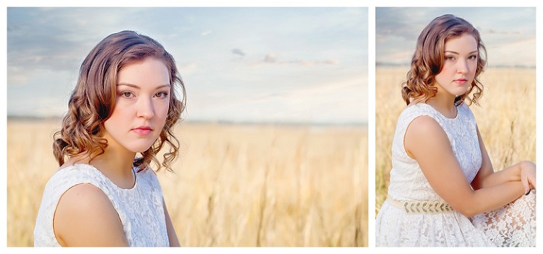 beautiful senior in a white dress in the tall marsh grass fields