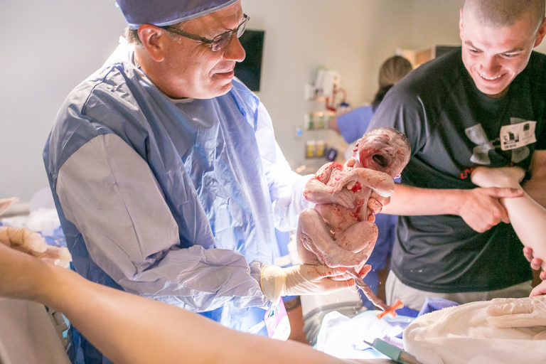 beaufort memorial birth photographer baby born dad smiling