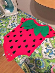 Red Onesie with Black Seeds and a leaf collar DIY Strawberry Costume