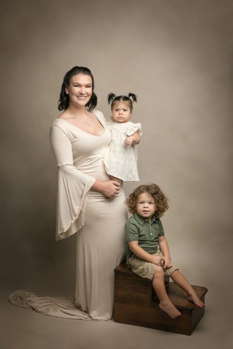 family studio photography mom with two kids