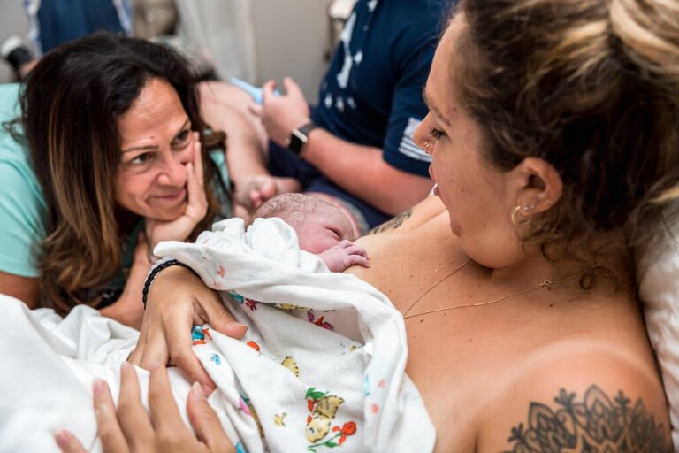 grandmother admiring her daughter just after her babies birth in Savannah Georgia 