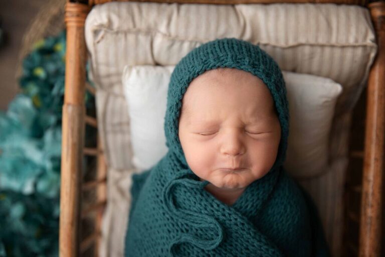 frowning baby about to cry Newborn portrait studio Beaufort South Carolina